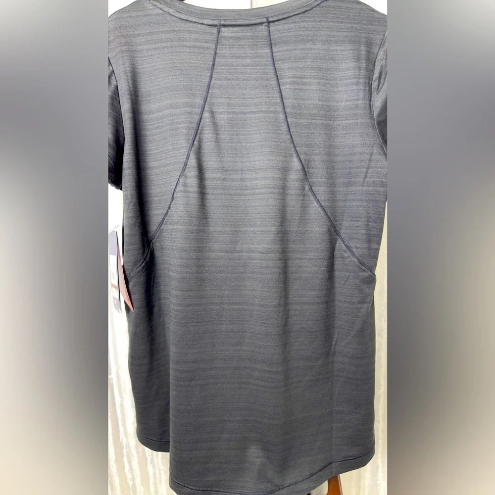 Reebok women’s small slim fit black athletic shirt​